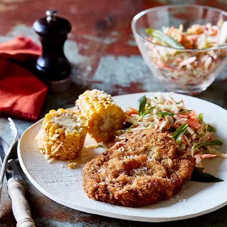 Rosemary schnitzel with coleslaw & corn